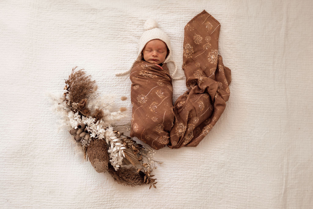 US stockist of Snuggle Hunny Kids organic muslin dandelion wrap