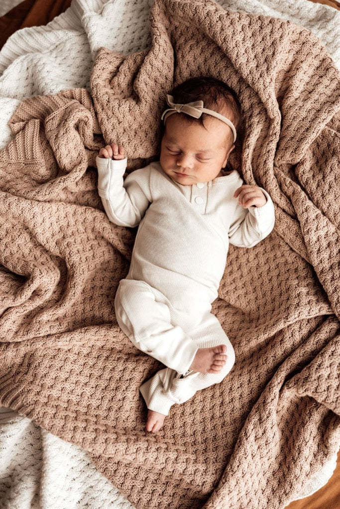 US stockist of Snuggle Hunny Kid's organic cotton jersey, halo zip footed sleeper.