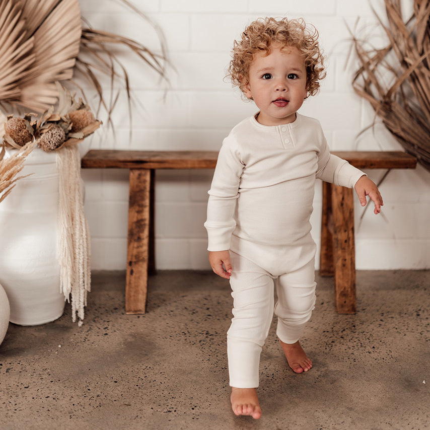 US stockist of Snuggle Hunny Kid's organic cotton jersey, halo zip footed sleeper.