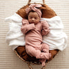 US stockist of Snuggle Hunny Kid's organic cotton jersey, rose ruffle zip footed sleeper.
