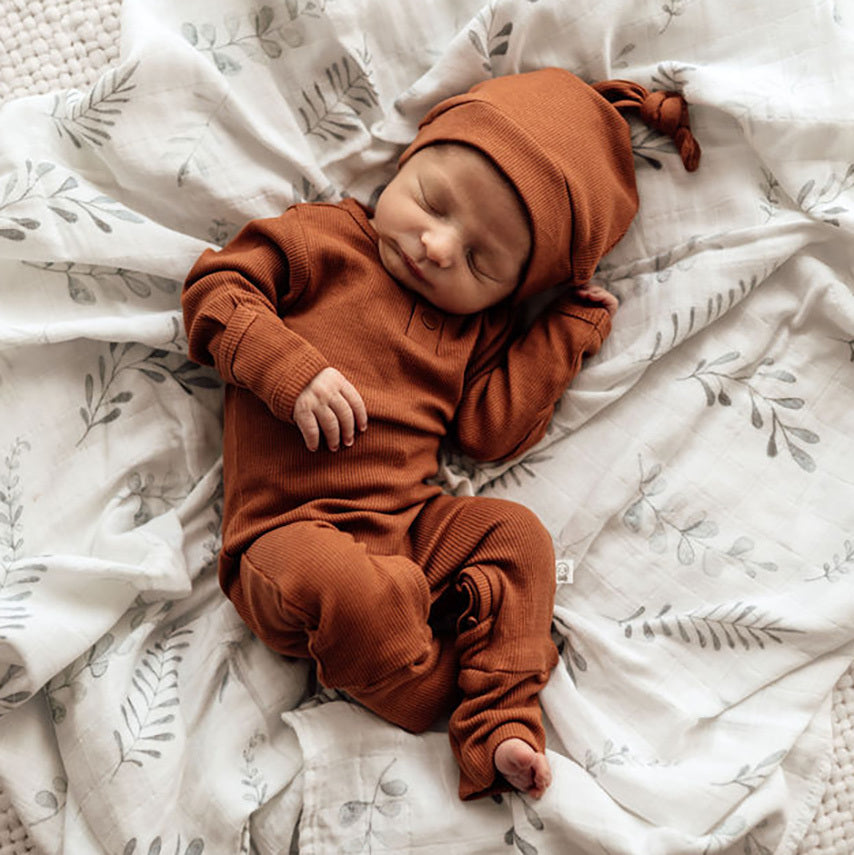 US stockist of Snuggle Hunny Kid's organic cotton jersey, biscuit zip footed sleeper.