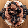 US stockist of Snuggle Hunny Kid's organic jersey Belle ruffle zip growsuit.