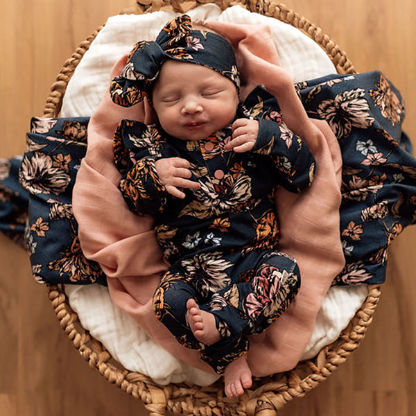 US stockist of Snuggle Hunny Kid's organic jersey Belle ruffle zip growsuit.