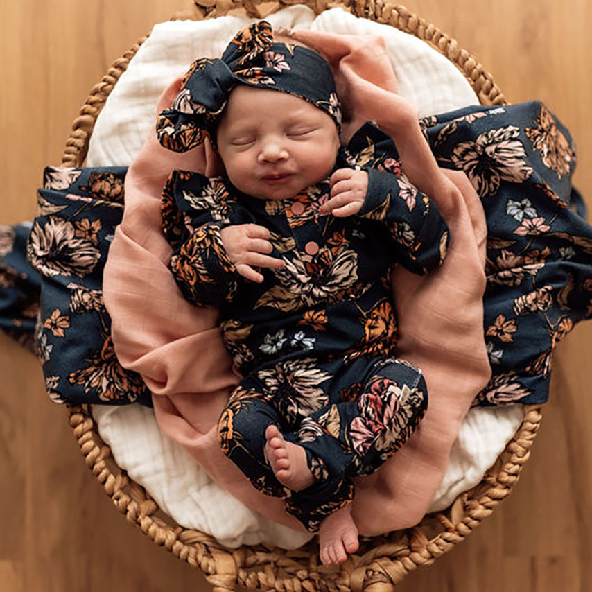 US stockist of Snuggle Hunny Kid's organic jersey Belle ruffle zip growsuit.