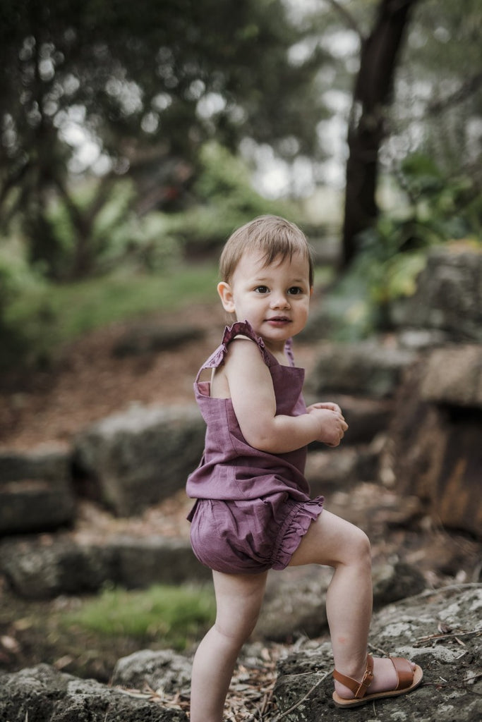US stockist of Five O' Six's Jacquard Weave Frill Set in a deep plum color.  Made from organic linen.