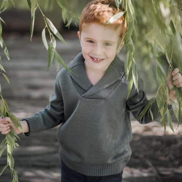 US stockist of Five O' Six's gender neutral "Charcoal" shawl neck sweater made from 100% merino wool.