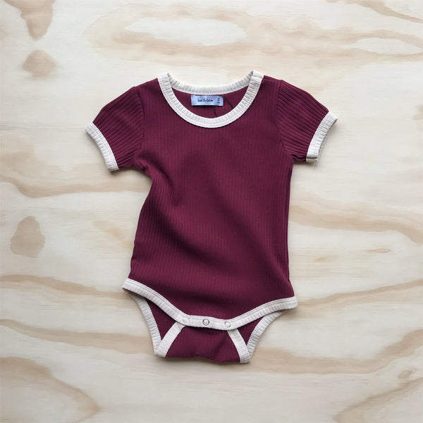 US stockist of ribbed cotton retro ringer bodysuit in berry