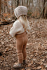 US stockist of Silly Silas' gender neutral, footed Teddy tights in Light Brown.  Made from 100% okeo tex cotton with retro braces.