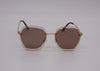 US stockist of Elle Porte's Harper sunglasses.  Features hexagon shaped brown lenses with gold frames, rated at UV 400