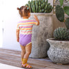 US stockist of Lacey Lane's Alice Rainbow Romper.