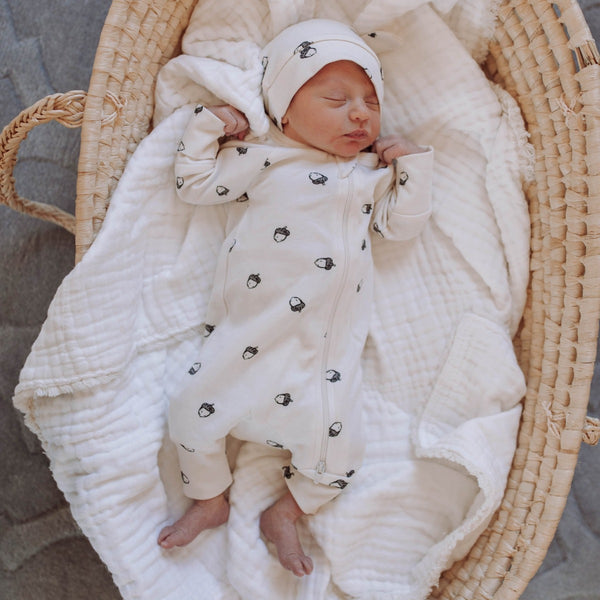 US stockist of Buck & Baa's gender neutral, organic cotton Acorn zip romper.
