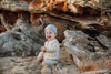 US stockist of Grown Clothing's gender neutral, organic cotton ribbed button jumpsuit in Natural.