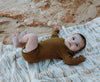 US stockist of Grown Clothing's gender neutral, organic cotton ribbed essential bodysuit in Moss.