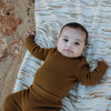 US stockist of Grown Clothing's gender neutral, organic cotton ribbed essential bodysuit in Moss.
