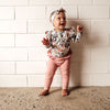 US stockist of Snuggle Hunny Kid's organic long sleeve ruffle bodysuit in Australiana.