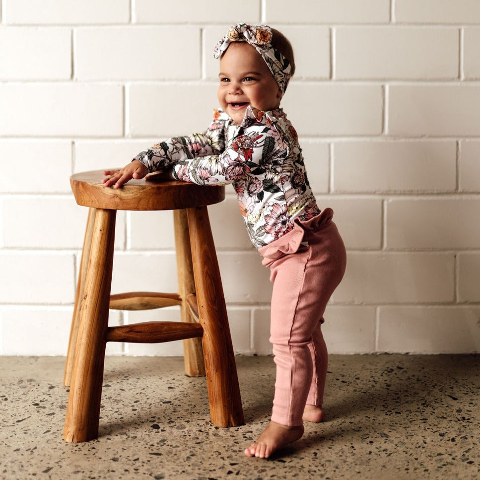 US stockist of Snuggle Hunny Kid's organic long sleeve ruffle bodysuit in Australiana.