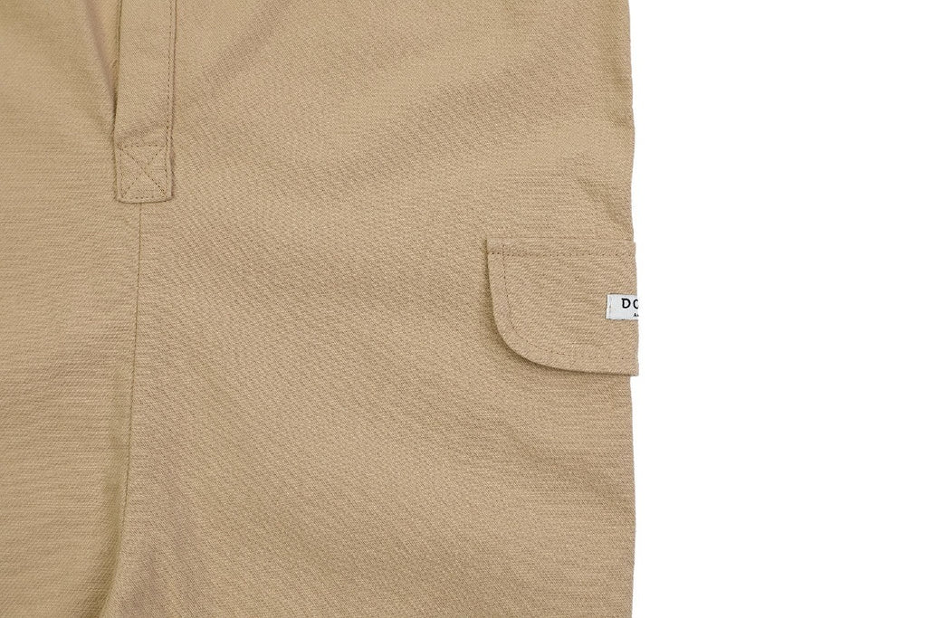 US stockist of Donsje's handmade, gender neutral Aspen Jumpsuit in Khaki.