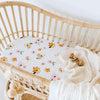 US stockist of Snuggle Hunny Kid's Poppy stretch cotton jersey bassinet sheet. White color with pink and yellow poppy print.