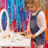 US stockist of Make Me Iconic's 11 piece wooden beauty kit.  Contains pretend play lipsticks, hair dryer, nail polishes and more.