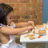 US stockist of Make Me Iconic's 11 piece wooden beauty kit.  Contains pretend play lipsticks, hair dryer, nail polishes and more.