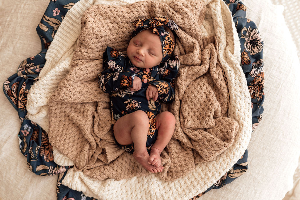 US stockist of Snuggle Hunny Kid's organic long sleeve ruffle bodysuit in Belle.