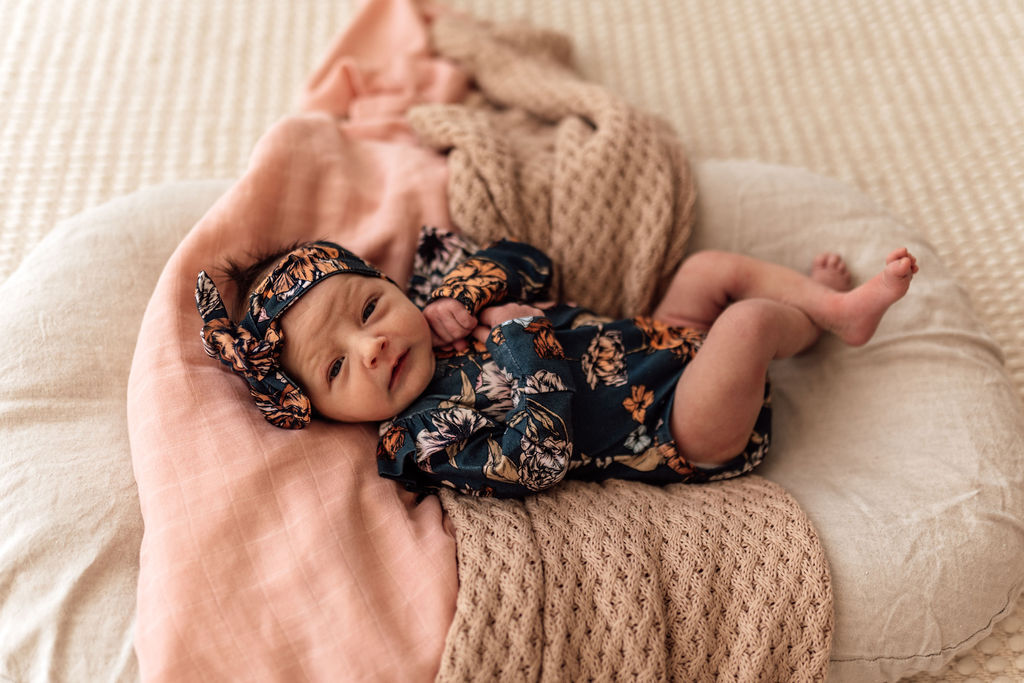 US stockist of Snuggle Hunny Kid's organic long sleeve ruffle bodysuit in Belle.
