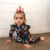 US stockist of Snuggle Hunny Kid's organic jersey Belle ruffle zip growsuit.