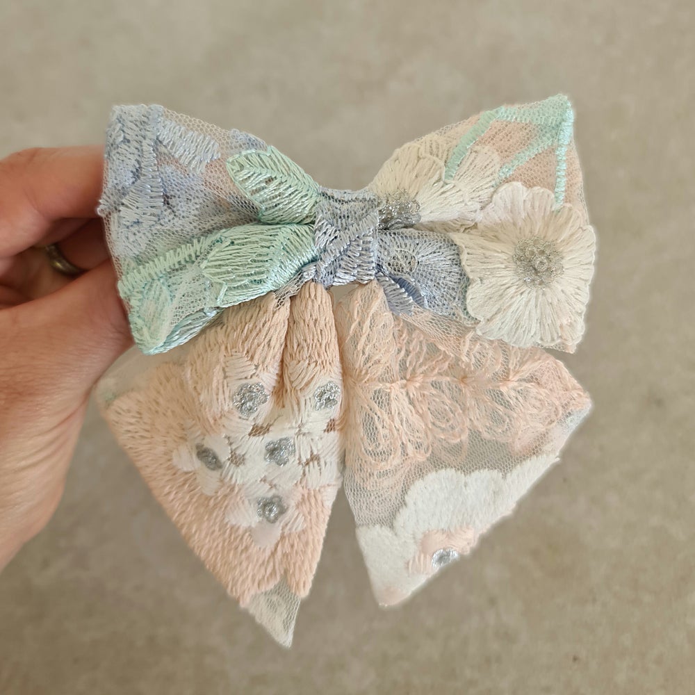 US stockist of Mauve & May's Coral Bow hair clip.