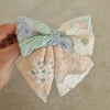 US stockist of Mauve & May's Coral Bow hair clip.