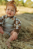 US stockist of Grown's gender neutral organic funfetti romper in Sea