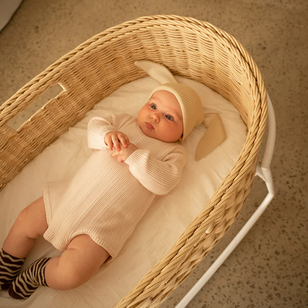 US stockist of Grown's organic ribbed bodysuit in Pink Salt