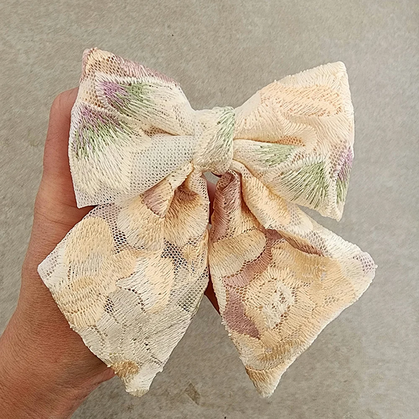 US stockist of Mauve & May's Dawn bow hair clip