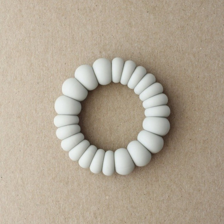 US stockist of Little Chew's gender neutral Diego Freezer Teether in Soft Sage.