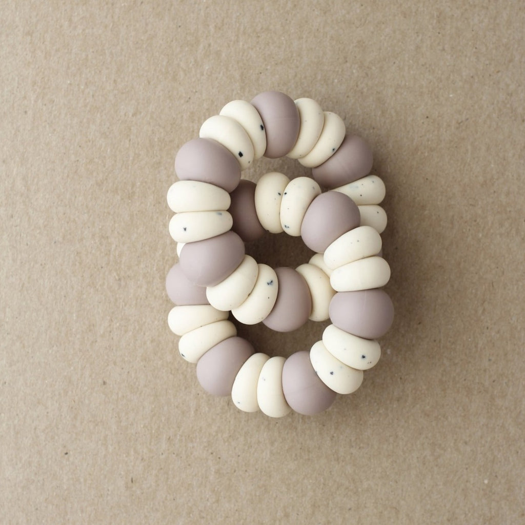 US stockist of Little Chew's gender neutral Polka Dot silicone double freezer teether in Dusted Fondant
