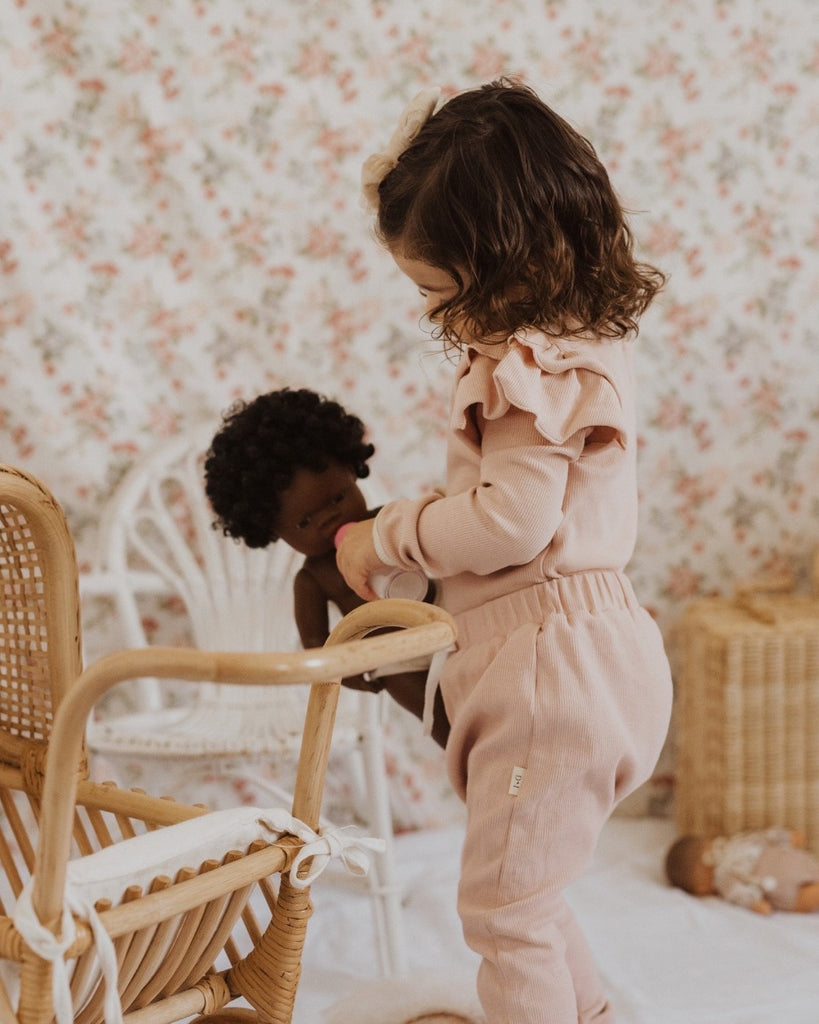 US stockist of India + Grace The Label's relaxed fit ribbed cotton leggings in dusty pink.  Features contrasting cream cuffs and non functional drawstring at waist.