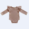 US stockist of India + Grace The Label's dusty pink long sleeved ribbed cotton bodysuit.  Features crotch snaps and beautiful ruffles at shoulder.  