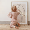 US stockist of India + Grace The Label's relaxed fit ribbed cotton leggings in dusty pink.  Features contrasting cream cuffs and non functional drawstring at waist.