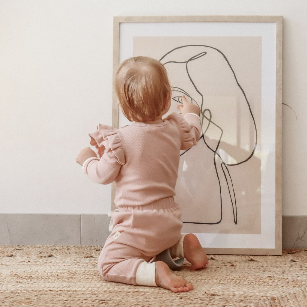 US stockist of India + Grace The Label's relaxed fit ribbed cotton leggings in dusty pink.  Features contrasting cream cuffs and non functional drawstring at waist.