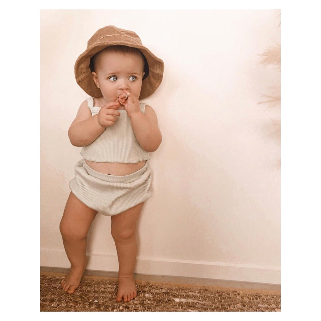 US stockist of Fini the Label's tan bucket hat made from soft terry towelling fabric.