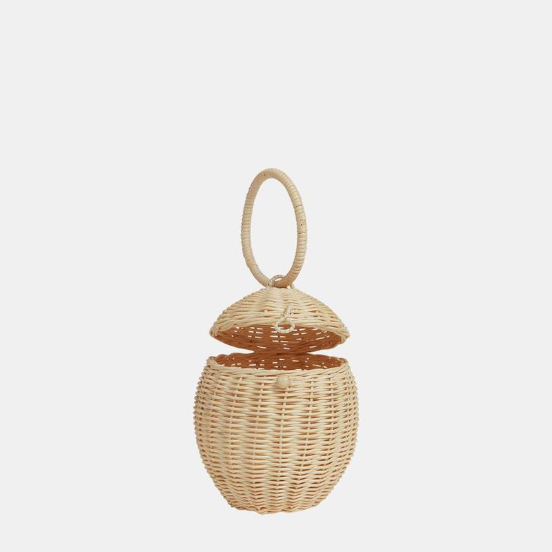US stockist of Olli Ella's handmade rattan egg basket.  Opens at top and features a handle on top.