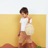 US stockist of Olli Ella's handmade rattan egg basket.  Opens at top and features a handle on top.