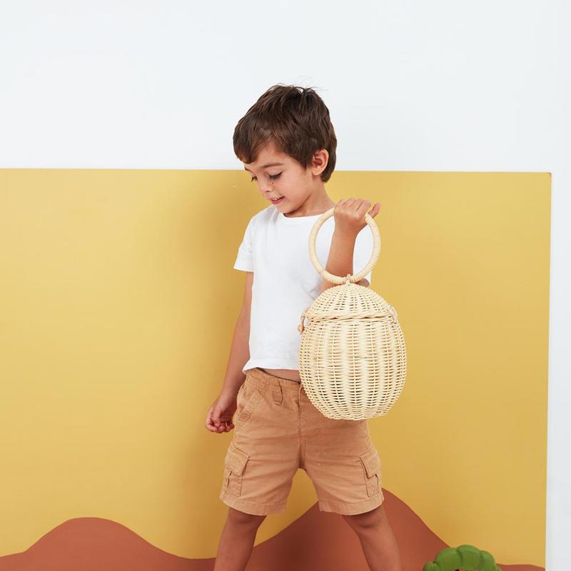 US stockist of Olli Ella's handmade rattan egg basket.  Opens at top and features a handle on top.