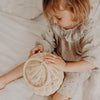 US stockist of Olli Ella's handmade rattan egg basket.  Opens at top and features a handle on top.
