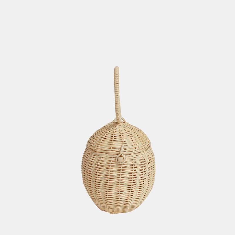US stockist of Olli Ella's handmade rattan egg basket.  Opens at top and features a handle on top.