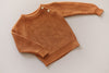 US stockist of Two Darlings gender neutral rust knit sweater.  Made from 100% cotton with two wood like buttons on the left shoulder.  Soft and stretchy.