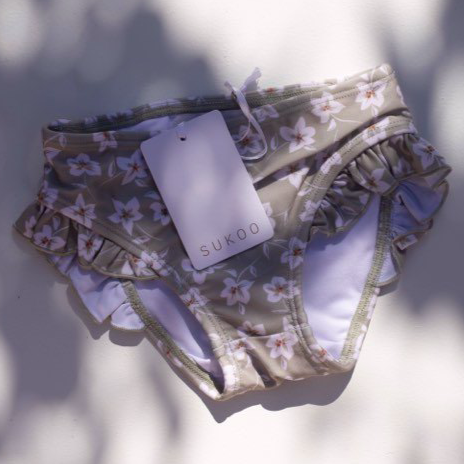 US stockist of Sukoo the Label's Frill Bikini Bottoms.  Made from UPF 50 + Repreve fabric with frill on the legs.  Pairs with the Belle Rash Top.