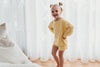 US stockist of Grown Clothing's gender neutral, linen blend beach sweater in Lemon.