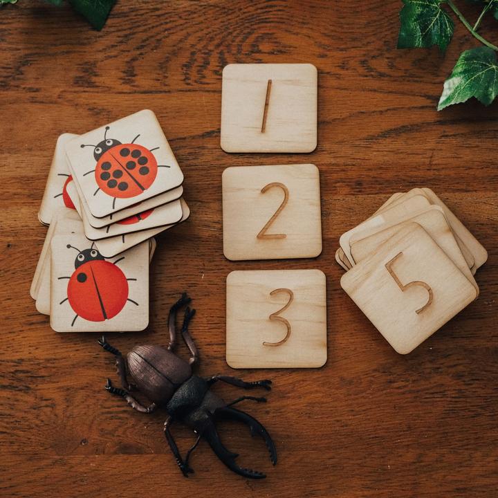 US stockist of Five Little Bear's Lady Bug Counting Puzzle.  Set of 24 pieces.