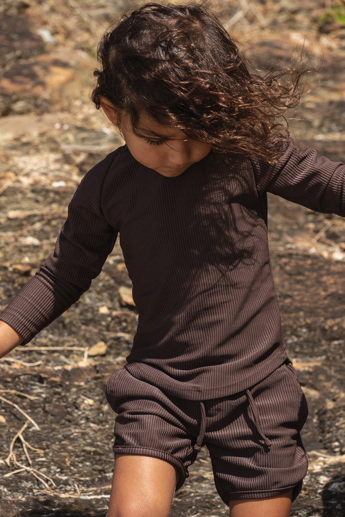 US stockist of Salty Swimwear's long sleeve Brook rash top in Eco Rib Chocolate.