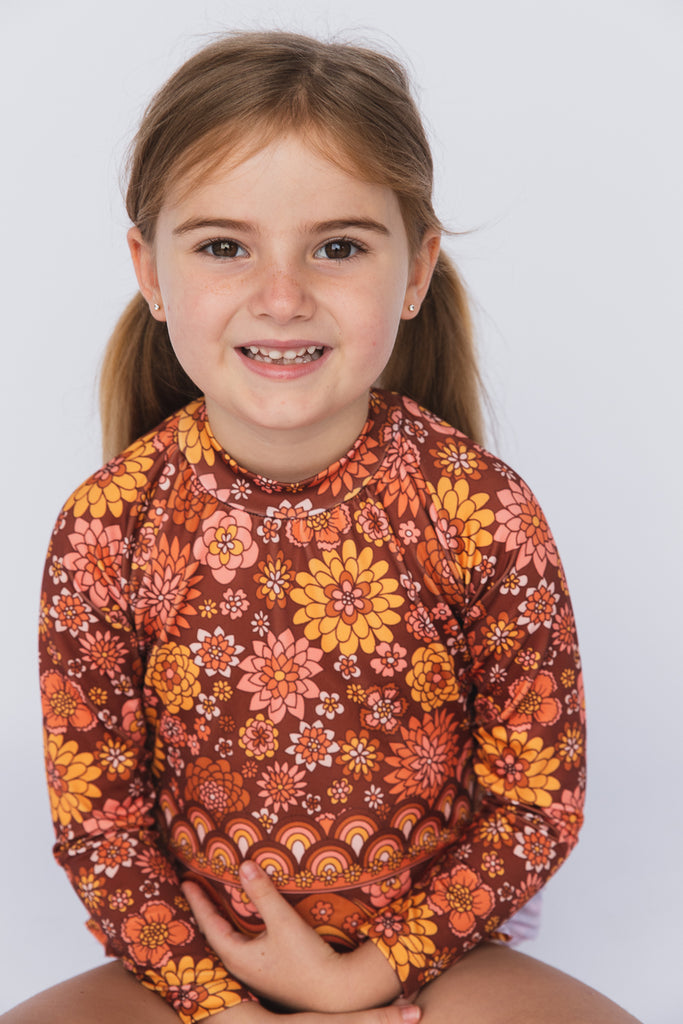 US stockist of Salty Swimwear's long sleeve rashsuit in In Bloom Tuscan.  Made from UPF 50+ Repreve fabric.